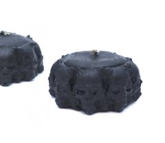 Свічка воскова Коло з черепів чорна, K89060058O1252433852 - фото товару