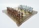 S16BMBRO шахматы "Manopoulos", "Спартанский воин", доска с узором, латунь, в деревянном футляре, коричневые, фигуры бронза/голубая патина, 28х28см, 3,4кг